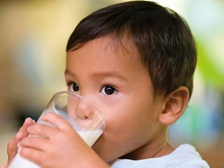 infant drinking milk